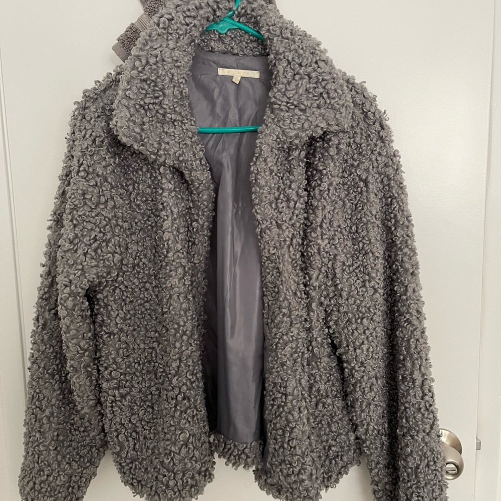 Grey - faux fur-like coat.